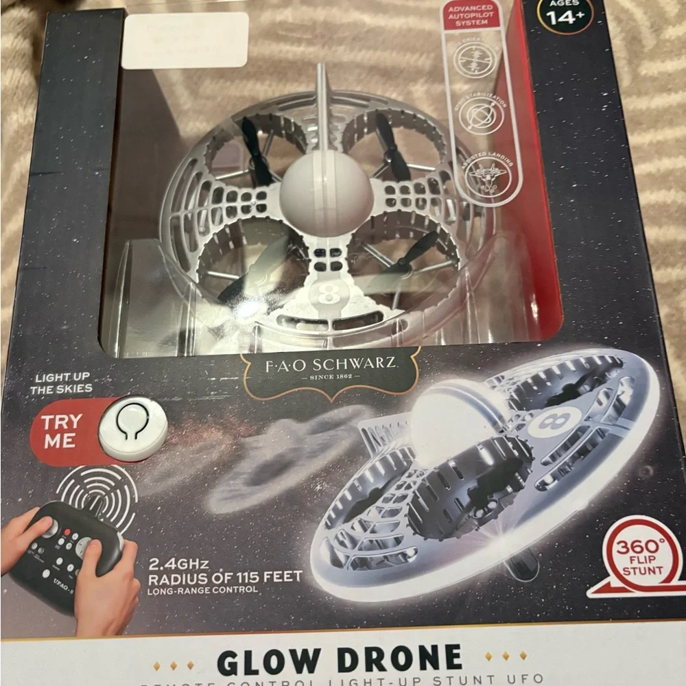 Open-box - FAO Schwarz Glow‎ Drone LED Stunt UFO Drone Lights 360° Flips Gyro